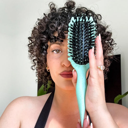 CurliZen curl defining brush with rowed bristles and ergonomic handle