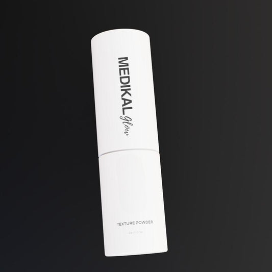 AirLift Texture & Volume Spray bottle on black pedestal showing hold, texture and shine scale