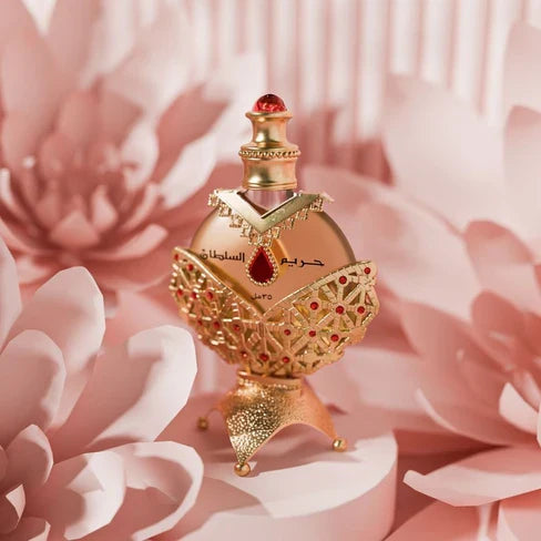 Sultan Aura Gold perfume oil — ornate gold bottle with dropper in palace setting