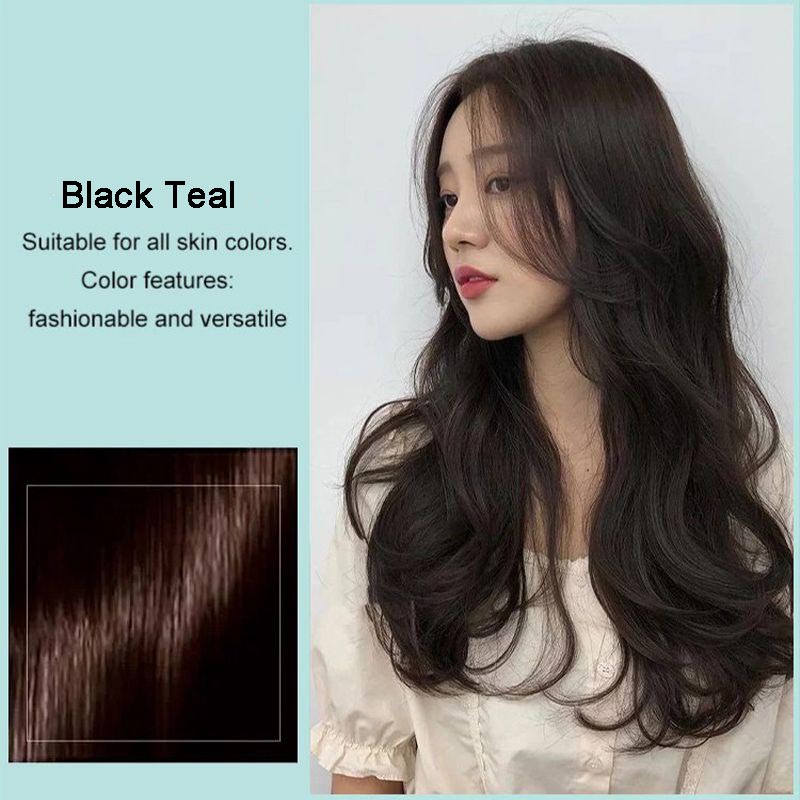Applying HerbaColor cream to roots for gray coverage