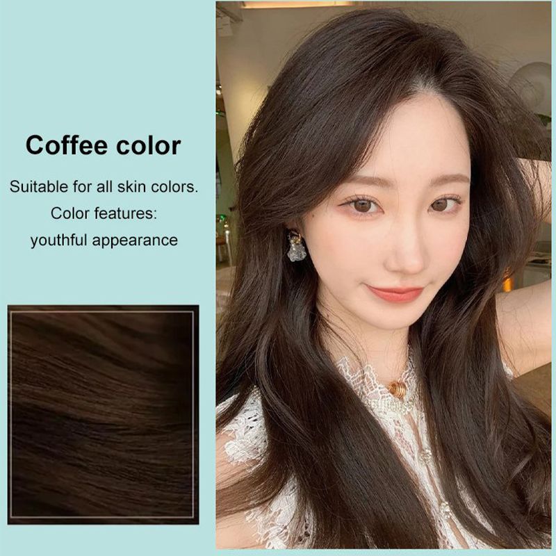 Applying HerbaColor cream to roots for gray coverage